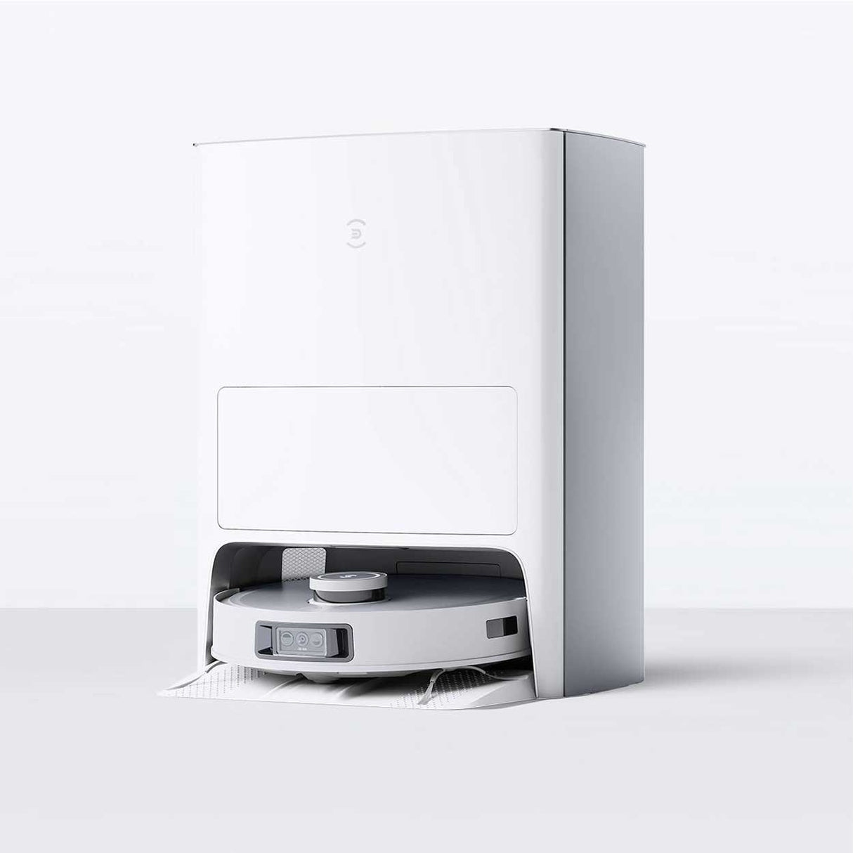 Robotic vacuum cleaner with charging dock on a white background